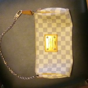 Louis Vuitton eva clutch (discontinued) rare hard to find. One owner no damage